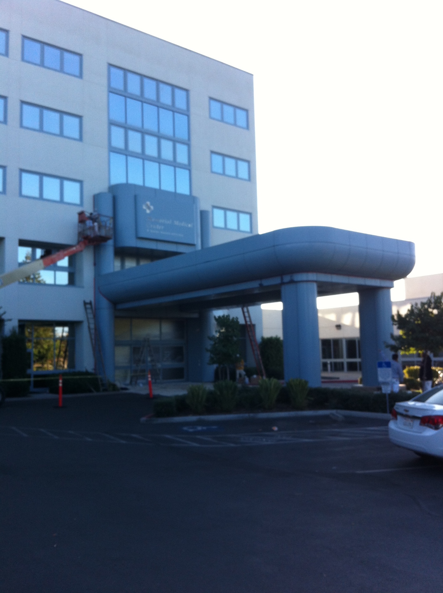 Memorial Medical Center entrance during exterior painting